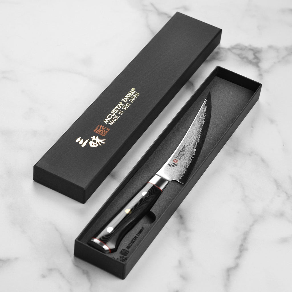 Zanmai Classic Pro Zebra Damascus 6.5" Curved Boning Knife