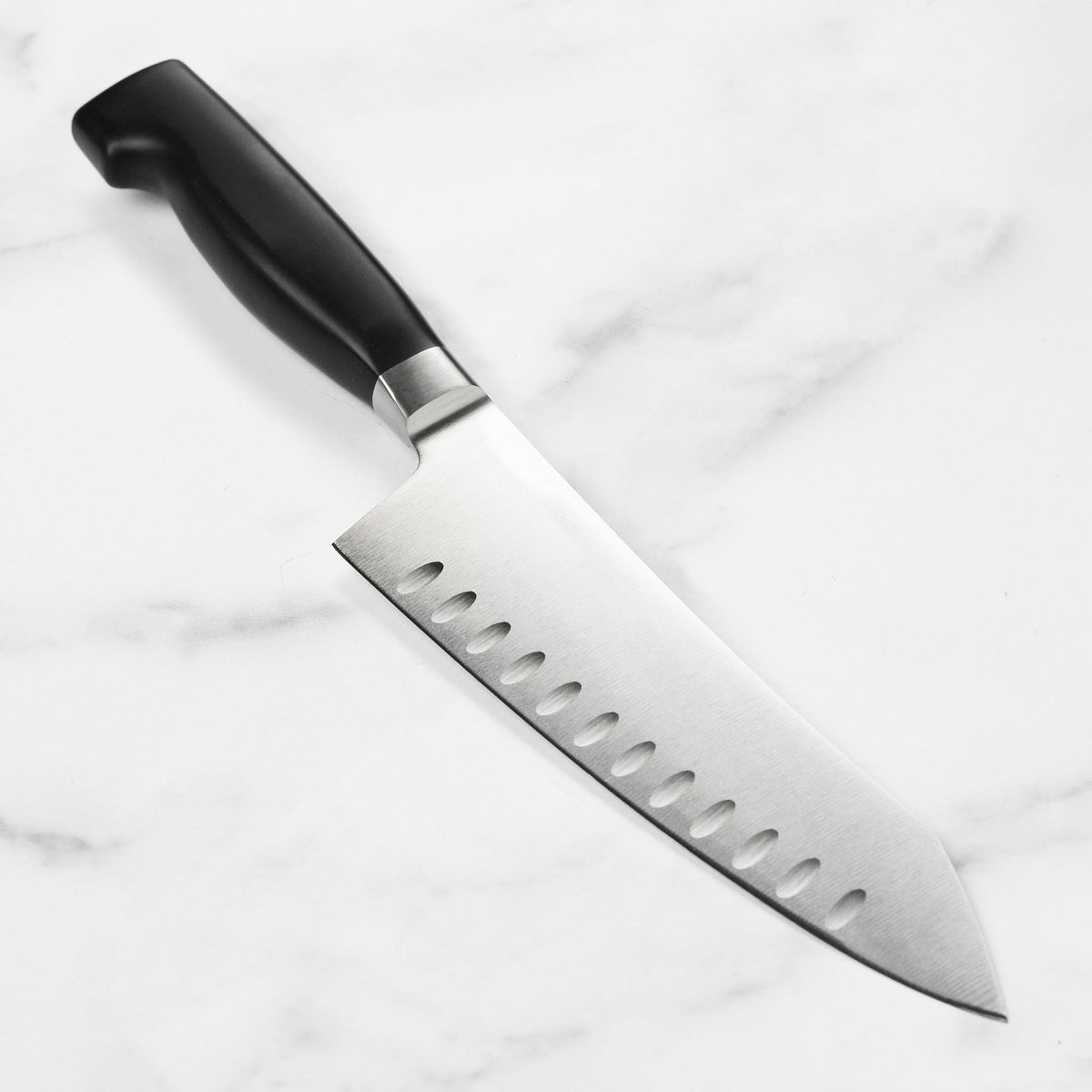 Zwilling Four Star 7" Hollow Edge Rocking Santoku Knife