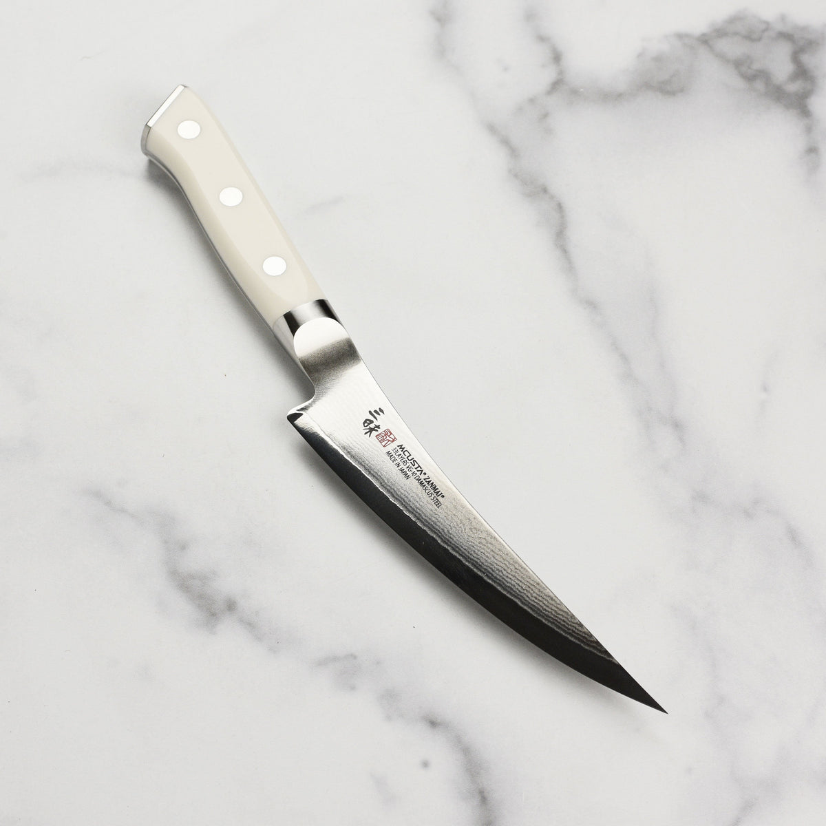 Zanmai Classic Damascus Corian 6.5" Curved Boning Knife